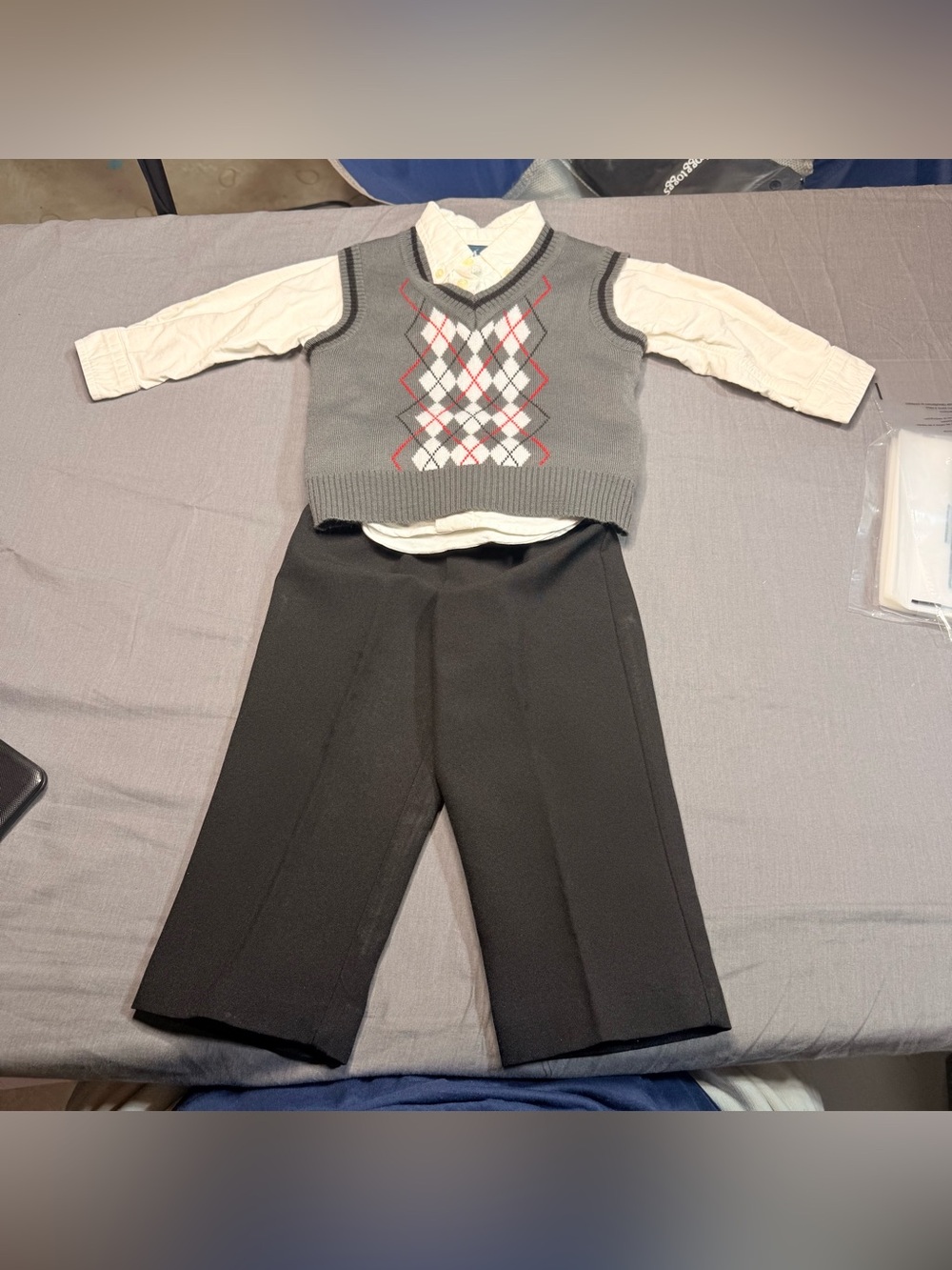 Ralph Lauren White top with Grey Argyle Sweater Vest and Black Pants